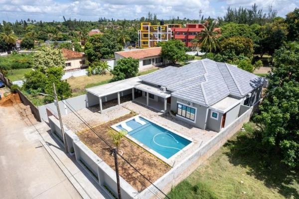 Moradia tipo 3+1(1 suíte),piscinaem condomínio privado na Cidade da Matola Promoção