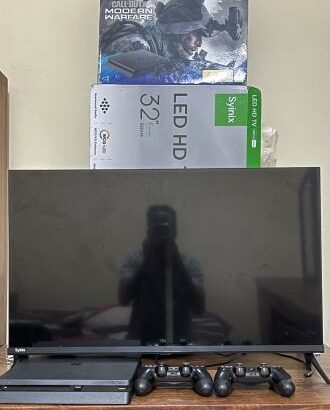 PS4 SLIM 500GB+2Joys+Cabo de Power+15 Jogos+ Tv Synix 32” Com caixa